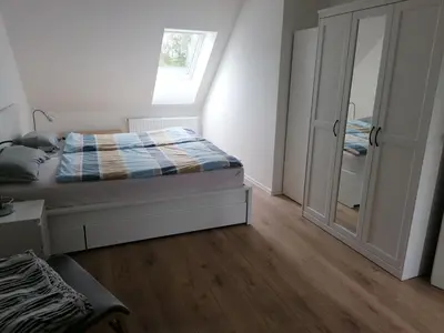 Ein Bett oder Betten in einem Zimmer der Unterkunft Ferienwohnung Niegel