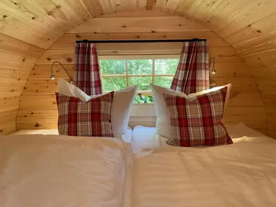 Ein Bett oder Betten in einem Zimmer der Unterkunft Timmi Lake