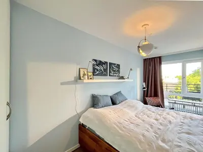 Ein Bett oder Betten in einem Zimmer der Unterkunft Residenz am Hang Residenz am Hang MEERHAASE Appartement 514
