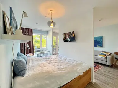 Ein Bett oder Betten in einem Zimmer der Unterkunft Residenz am Hang Residenz am Hang MEERHAASE Appartement 514