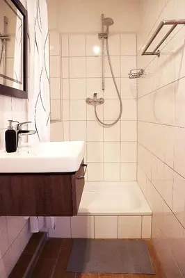 Ein Badezimmer in der Unterkunft Charmante strandnahe Ferienwohnung im Untergeschoss mit gratis Bettwäsche-Paket
