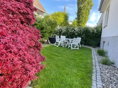 Ein Garten an der Unterkunft Ferienwohnung Ostseewellen