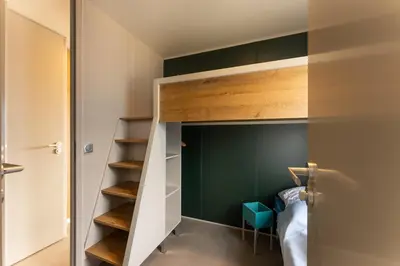 Ein Bett oder Betten in einem Zimmer der Unterkunft Boje 64