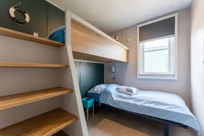 Ein Bett oder Betten in einem Zimmer der Unterkunft Boje 66
