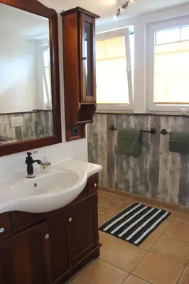 Ein Badezimmer in der Unterkunft Ferienwohnung Störtebeker