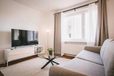TV/Unterhaltungsangebot in der Unterkunft Sadebo Modern City Lübeck - Balkon oder Terrasse