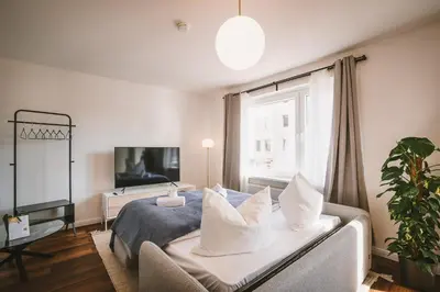 TV/Unterhaltungsangebot in der Unterkunft Sadebo Modern City Lübeck - Balkon oder Terrasse