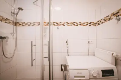 Ein Badezimmer in der Unterkunft Sadebo Modern City Lübeck - Balkon oder Terrasse