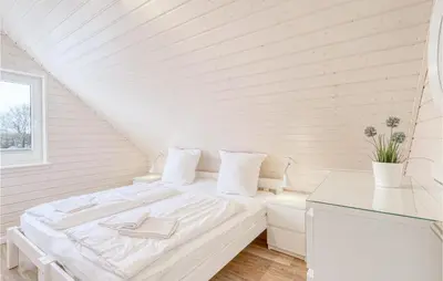 Ein Bett oder Betten in einem Zimmer der Unterkunft Amazing Home In Krems Iiwarderbrück