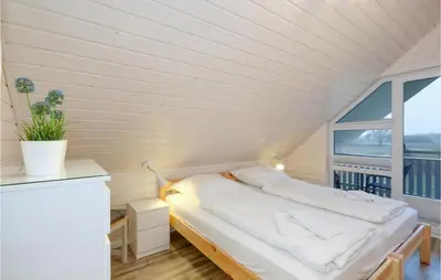 Ein Bett oder Betten in einem Zimmer der Unterkunft Cozy Home In Krems Iiwarderbrück