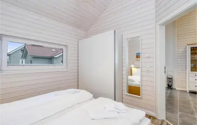 Ein Bett oder Betten in einem Zimmer der Unterkunft Amazing Home In Krems Iiwarderbrück