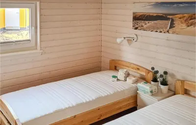 Ein Bett oder Betten in einem Zimmer der Unterkunft Cozy Home In Krems Iiwarderbrück