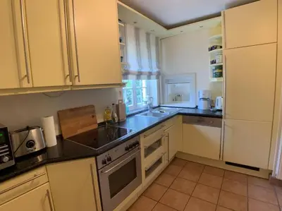 Küche/Küchenzeile in der Unterkunft Top Lage! Charmantes Landhaus 5 Geh-Min v. Strand