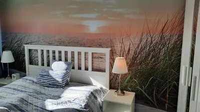 Ein Bett oder Betten in einem Zimmer der Unterkunft Cosy House mit Garten, Hunde willkommen