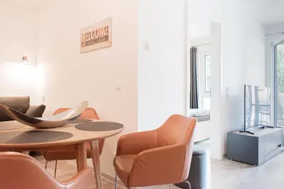Ein Sitzbereich in der Unterkunft Ferienwohnung Stern 3 Scharbeutz