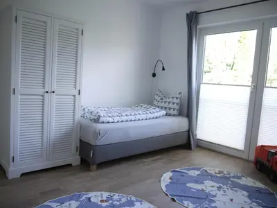 Ein Bett oder Betten in einem Zimmer der Unterkunft Haffliebe 1