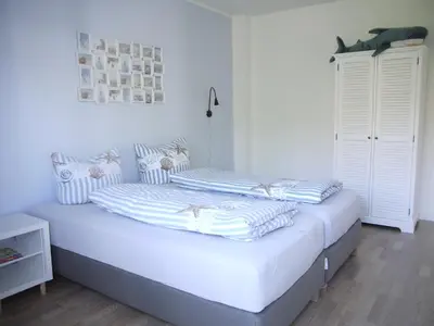 Ein Bett oder Betten in einem Zimmer der Unterkunft Haffliebe 1