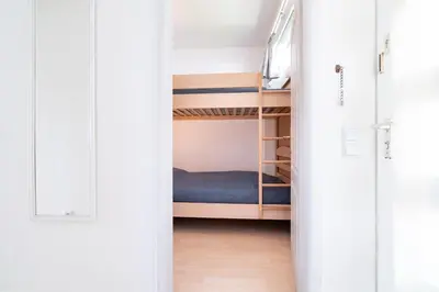 Ein Bett oder Betten in einem Zimmer der Unterkunft Ferienpark Sierksdorf App 106 - Strandlage