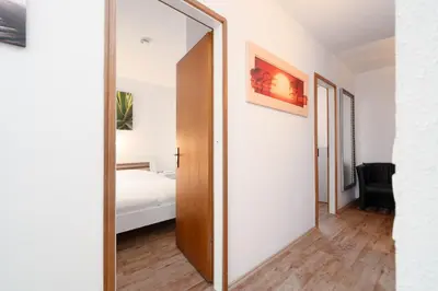 Ein Bett oder Betten in einem Zimmer der Unterkunft Ferienpark Sierksdorf App 461 - Strandlage