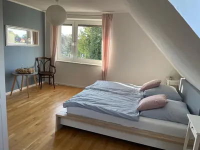 Ein Bett oder Betten in einem Zimmer der Unterkunft Ferienhaus Storchennest