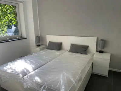 Ein Bett oder Betten in einem Zimmer der Unterkunft Ferienhaus Storchennest