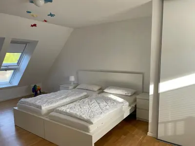 Ein Bett oder Betten in einem Zimmer der Unterkunft Ferienhaus Storchennest