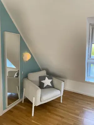Ein Sitzbereich in der Unterkunft Ferienhaus Storchennest