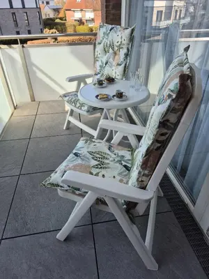 Ein Balkon oder eine Terrasse in der Unterkunft Sunshine Apartment