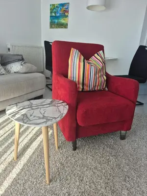 Ein Sitzbereich in der Unterkunft Sunshine Apartment
