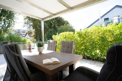Ein Garten an der Unterkunft Gorch-Fock-Ring 19 Meerzeit I