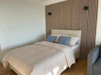 Ein Bett oder Betten in einem Zimmer der Unterkunft Appartment bezaubernder Landblick