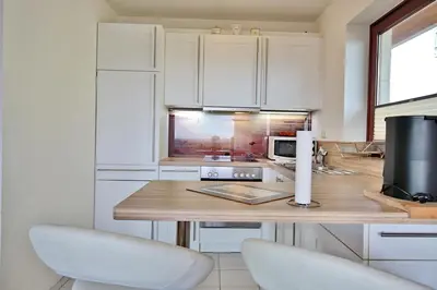 Küche/Küchenzeile in der Unterkunft Haus Strandallee 24 Haus Strandallee 24 - Appartement Seemanns Meeresblick