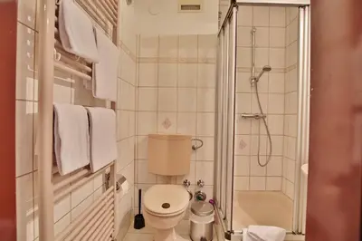 Ein Badezimmer in der Unterkunft Haus Strandallee 24 Haus Strandallee 24 - Appartement Seemanns Meeresblick