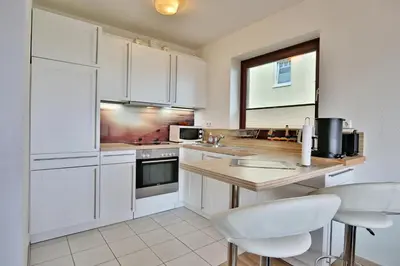 Küche/Küchenzeile in der Unterkunft Haus Strandallee 24 Haus Strandallee 24 - Appartement Seemanns Meeresblick
