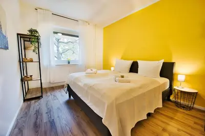 Ein Bett oder Betten in einem Zimmer der Unterkunft HejU - Altbau meets Design - Parkplatz - Netflix