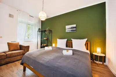 Ein Bett oder Betten in einem Zimmer der Unterkunft HejU - Altbau meets Design - Parkplatz - Netflix