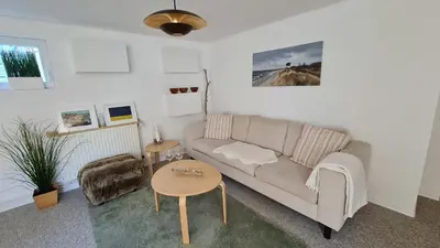 Ein Sitzbereich in der Unterkunft Ferienhaus Boje14a