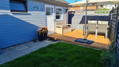 Ein Garten an der Unterkunft Ferienhaus Boje14a