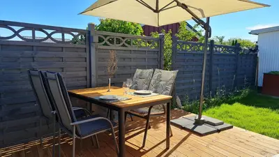 Ein Garten an der Unterkunft Ferienhaus Boje14a