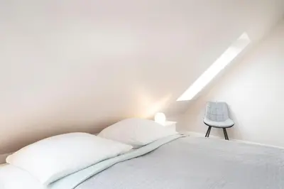 Ein Bett oder Betten in einem Zimmer der Unterkunft Kammerweg 89 Düne 28
