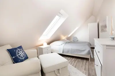 Ein Bett oder Betten in einem Zimmer der Unterkunft Kammerweg 89 Düne 28