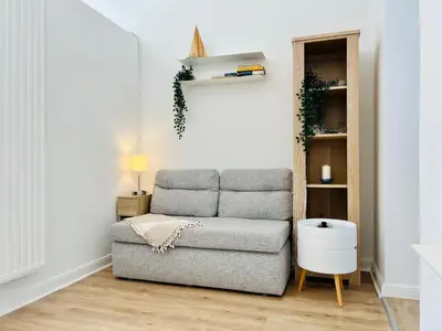 Ein Sitzbereich in der Unterkunft Strand Studio mit Meerblick & Balkon