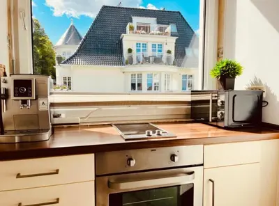 Küche/Küchenzeile in der Unterkunft Strand Studio mit Meerblick & Balkon