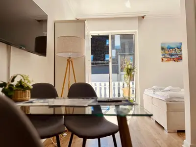 Ein Sitzbereich in der Unterkunft Strand Studio mit Meerblick & Balkon