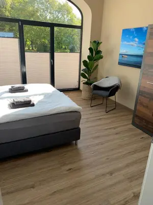 Ein Bett oder Betten in einem Zimmer der Unterkunft Ferienwohnung 1 am Herrenhaus Ahrensbök