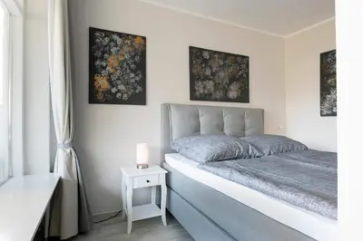 Ein Bett oder Betten in einem Zimmer der Unterkunft Panoramic Sierksdorf Panoramic Ostseezauber