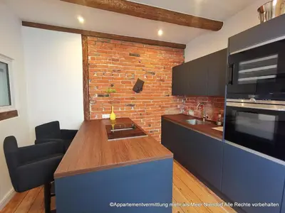 Küche/Küchenzeile in der Unterkunft Ferienhaus Urban Fewo Beletage 2 bis 6 Personen mit Panorama Meerblick WLAN gegenüber vom Strand