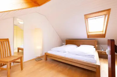 Ein Bett oder Betten in einem Zimmer der Unterkunft BEE1 Ferienwohnung Ernstorfer