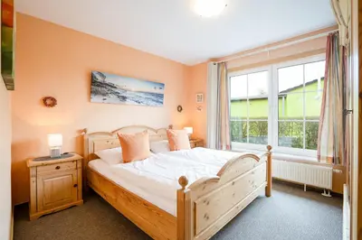 Ein Bett oder Betten in einem Zimmer der Unterkunft BIR9b Ferienwohnung Vahle