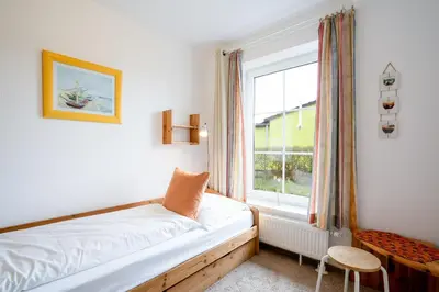 Ein Bett oder Betten in einem Zimmer der Unterkunft BIR9b Ferienwohnung Vahle